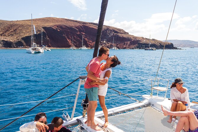 Santorini Sailing Sunset Catamaran Cruise w/ Greek BBQ @Thirasia