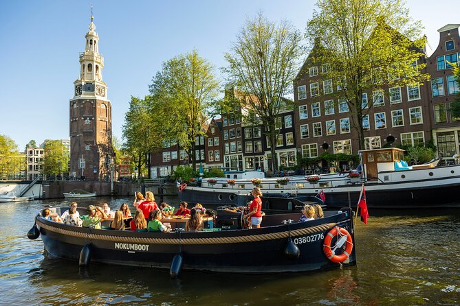 Amsterdam: Guided Open Boat Canal Cruise Including 1 Drink - What to Expect on the Day
