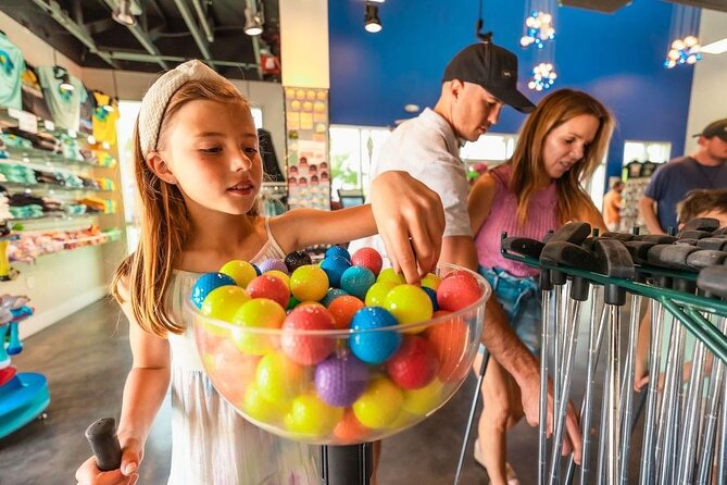 Mini Golf beneath SkyWheel Panama City Beach - The Sum Up