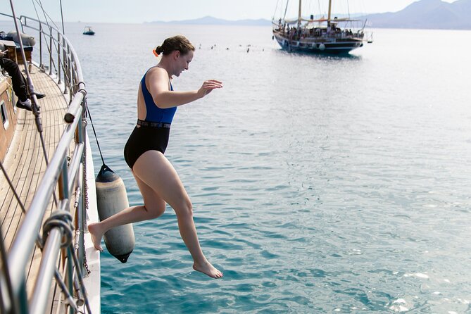 Sunset Dinner Cruise: Sunset, Swim, Drinks, and Dinner Onboard - Who Should Consider This Tour?