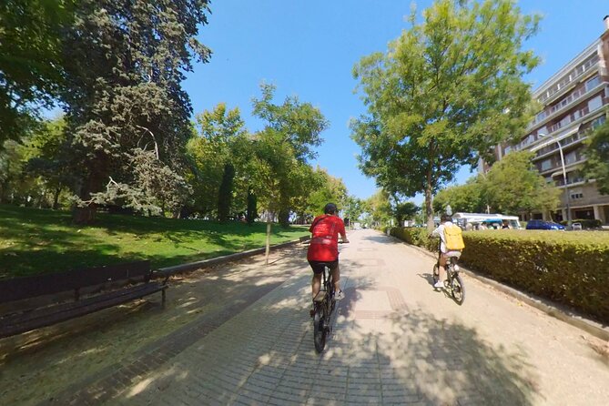 Sunset E-Bike Adventure: Green Madrid Tour - Passing Iconic Architectural Landmarks