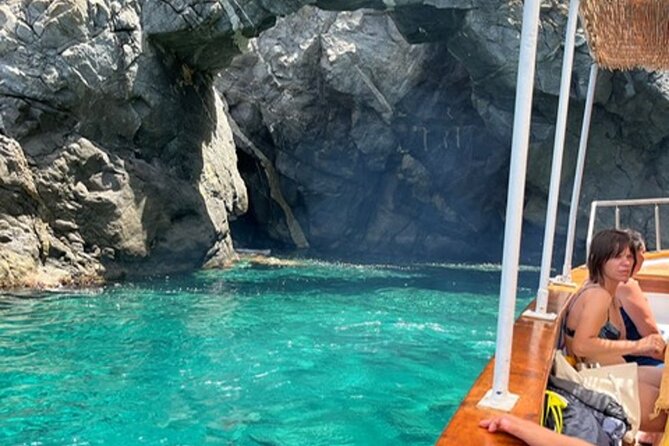 Sunset aperitif on a boat in Scilla - The Sum Up