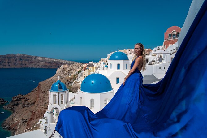 Flying Dress Photoshoot in Oia Private entry to Blue Dome - The Sum Up
