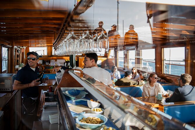 Live Music & Sunset Wooden Boat in Barcelona - The Sum Up