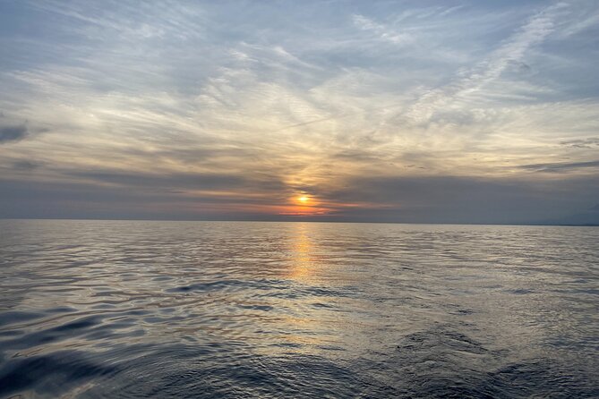 Sailing at sunset along the cliffs of Maro-Compartida - Good To Know