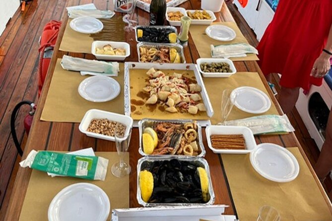 Sunset aperitif on a boat in Scilla - Sunset Aperitif on a Boat in Scilla – An Authentic Coastal Experience