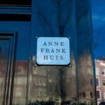 Amsterdam: Guided bike tour in French off the beaten track - Discovering Amsterdam by Bike: An Authentic, Education-Focused Tour