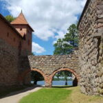 From Vilnius: Trakai Castle and Paneriai Memorial Tour - The Itinerary Breakdown
