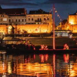 Toru: Toru at Night from a Boat on the Vistula - The Boats: A Nod to History