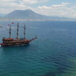 Alanya: Pirate Boat Party with Foam, Disco, Lunch & Drinks - Discovering the Caves and Coveted Swim Spots