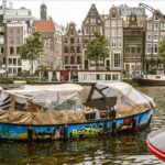 Amsterdam Daytime Boat Private Canal Cruise Tour With Guide - The Itinerary and What to Expect