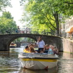 Amsterdam: Open Boat Canal Cruise (with Free Spritz Option) - What to Expect During the Tour