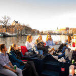 Amsterdam Small-Group Walking Tour with Canal Cruise - The Canal Cruise: From Streets to Waterways