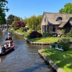 Amsterdam: Zaanse Schans and Giethoorn Guided Combo Tour - Journey to Giethoorn: The Venice of the Netherlands