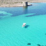 Boat tour of Asinara at sunset with aperitif on board - A Deep Dive into the Asinara Sunset Boat Tour