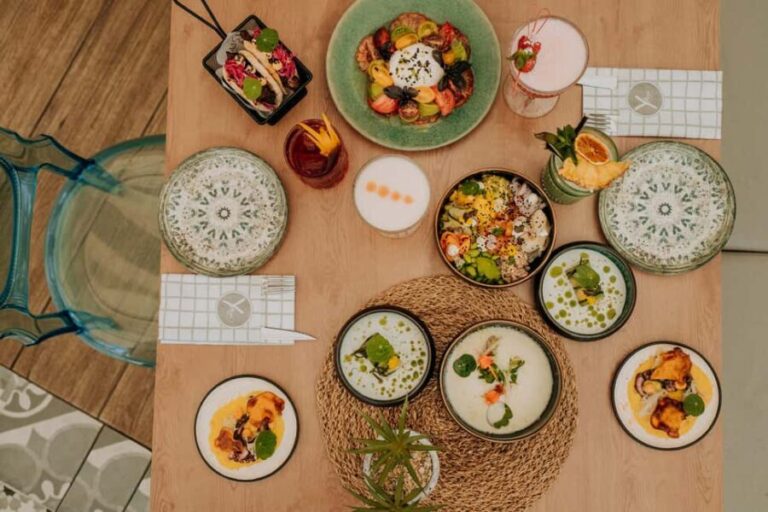 CALA D'OR: Gourmet Tapas Dinner with House Wine - Breaking Down the Itinerary and Experience