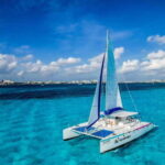 Cancun: Isla Mujeres Catamaran Tour with Open Bar of Drinks - Snorkeling in the Caribbean Reef