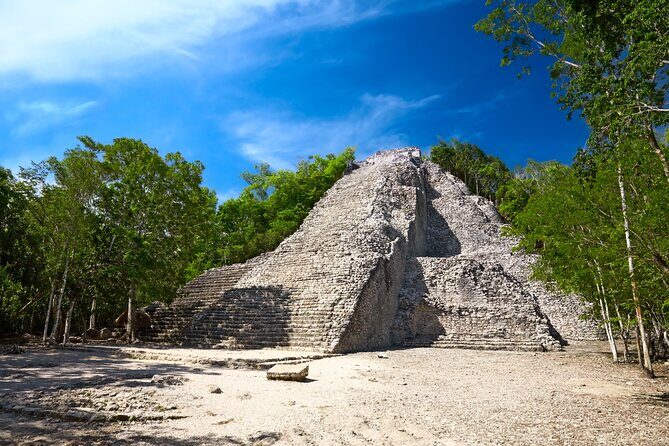 Coba Ruins Archeological Tour with Mayan Village at Sunset Time - First Stop: Coba Village and Cultural Introduction