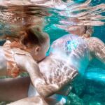 Exclusive underwater photo shoot in the sea near Palmain a turquoise blue bay - The Photos and How They Are Delivered