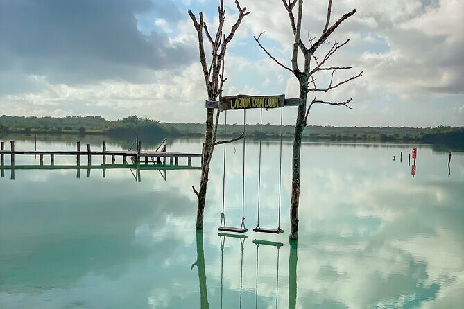 Explore 3 Cenotes + 1 Lagoon a tour Full Day only from Cancun - First Stop: Laguna Kaan Luum