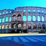 Explore layers of Pula's History in German or English - What to Know Before You Book