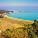 From Vilnius: All Day Tour to the Curonian Spit - Starting the Day: Hotel Pickup and Long Drive to Klaipeda