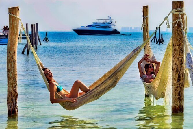 Full-Day Isla Mujeres Catamaran Cruise with Snorkeling & Beach Club - Who Should Consider This Tour?