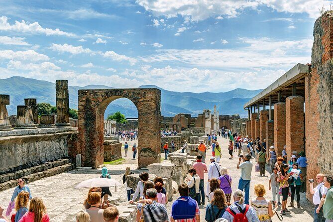 Guided Tour of Pompeii and Herculaneum with Lunch and Ticket - Pompeii: Walking Through the Past
