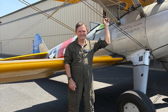 Historical Flight in an Open Cockpit Biplane from WWII - Who Will Love This Tour?