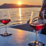 Krk: Sunset Boat Tour with wine, high chance of dolphins - The Experience on the Water