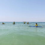 Lisbon: Surfing Lesson on Costa de Caparica Beach - Practical Details and Tips