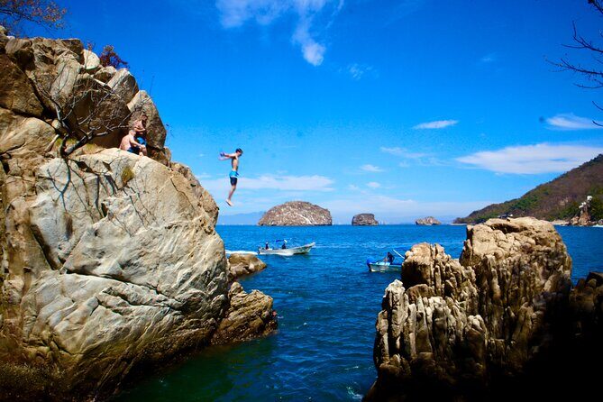 Los Arcos 5 islands Snorkeling Cliff Jumping and Hidden Beach - An In-Depth Look at the Los Arcos Islands Tour
