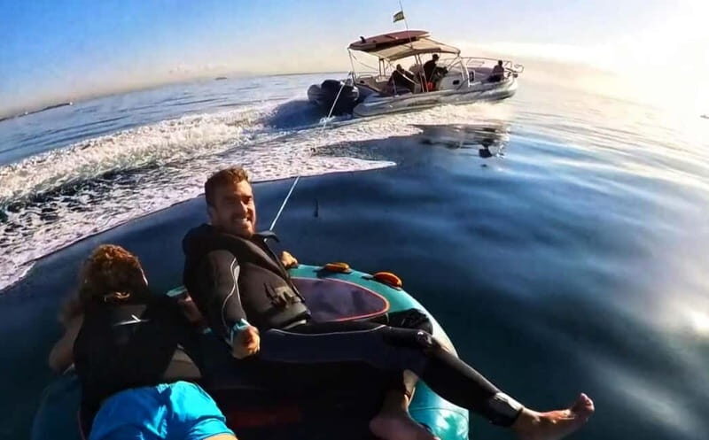 Mallorca: Private Watersports Boat. LUNCH Drinks SUP, Tubing - Water Toys and Activities