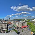 Montreal Private Walking Tour to Downtown RESO and Old Montreal - Admiring the Ring Sculpture and Phillips Square