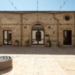 Nature and relaxation by the pool at Baglio Passofondo Estates - What to Expect During Your Visit