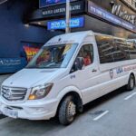 New York City: Guided Private Glass-Top Bus Tour at Night - The Transportation: Why the Glass-Top Bus Matters