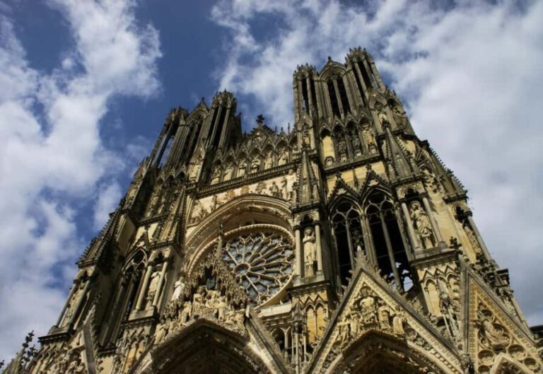 Paris: Champagne Region Day Trip with Expert Guide - Reims: The Birthplace of Champagne and Gothic Grandeur