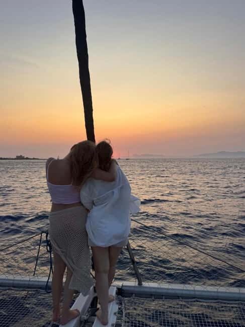 Rhodes: Sunset Catamaran Cruise with Snack, Fruits & Drinks - An Overview of the Experience