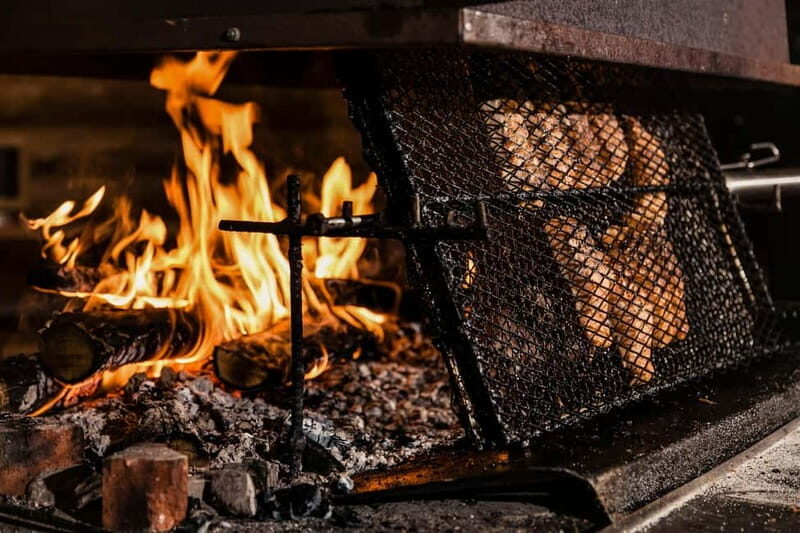 Rovaniemi: Snow Sauna Experience, Jacuzzi and Dinner in Kota - Dining in a Lappish Kota: A True Taste of Lapland