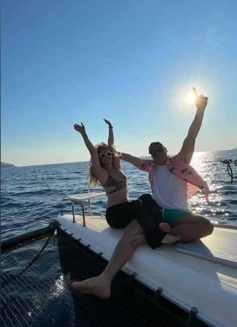 Santorini: Adventurous Catamaran Experience with Snorkeling - Snorkeling and Volcanic Hot Springs