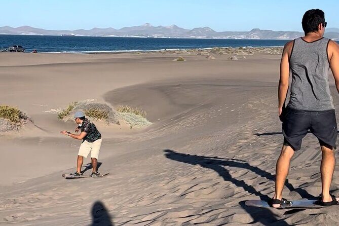 Slide into the sunset by Sandboarding in Las Dunas Del Mogote - Practical Details and Tips for Travelers