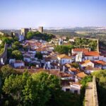 Transfer Tour Lisbon/Porto with 2 stops options Óbidos, Nazaré, Fátima, Coimbra - Who This Tour Is Perfect For