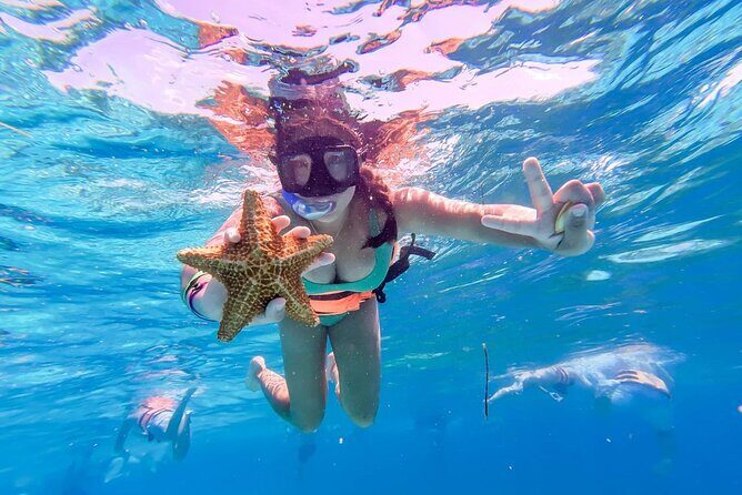 Fun Catamaran Excursion to Isla Mujeres with Unlimited drinks! - Snorkeling and Marine Adventures