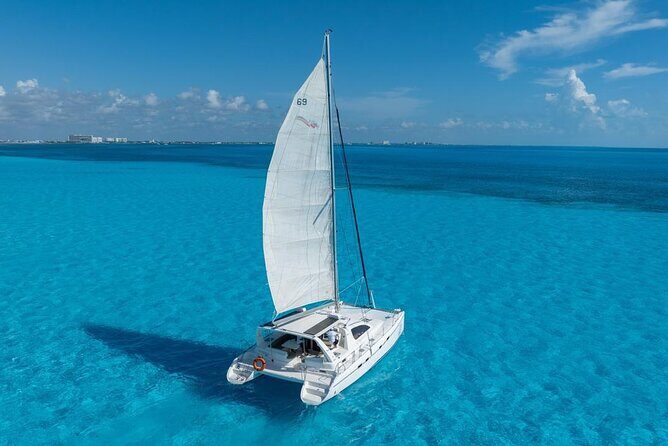 Isla Mujeres Day Tour with Catamaran, Snorkeling & Beach Club - Practical Details and Tips