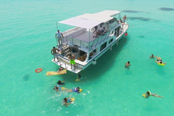 Isla Mujeres Full Day Tour on Yacht with Snorkel and Buffet - The Floating Buffet: Dining in a Scenic Setting