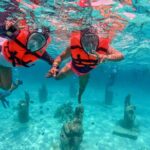 Isla Mujeres Spring Break Party Catamaran Snorkel and Open Bar - The Real Value of This Tour