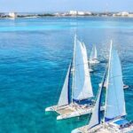 Isla Mujeres tour from Cancún (open bar, lunch ) - The Upward and Downward Sides