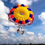 Bali's Triple Threat: Watersports - GWK Statue and Uluwatu - How does the day start, and what are the initial watersports experiences?