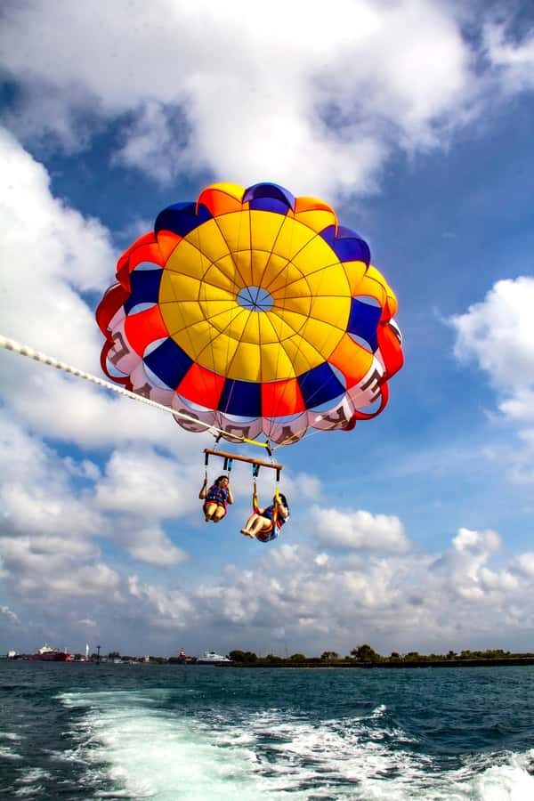 Bali's Triple Threat: Watersports - GWK Statue and Uluwatu - How does the day start, and what are the initial watersports experiences?