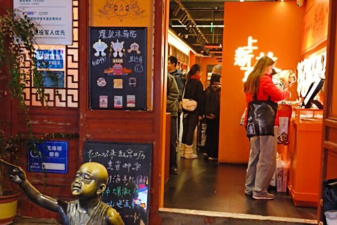 Beijing City Walk: Explore Hutongs Life and Old Beijing - Stop 1: Qianmen Walking Street and Dashilan